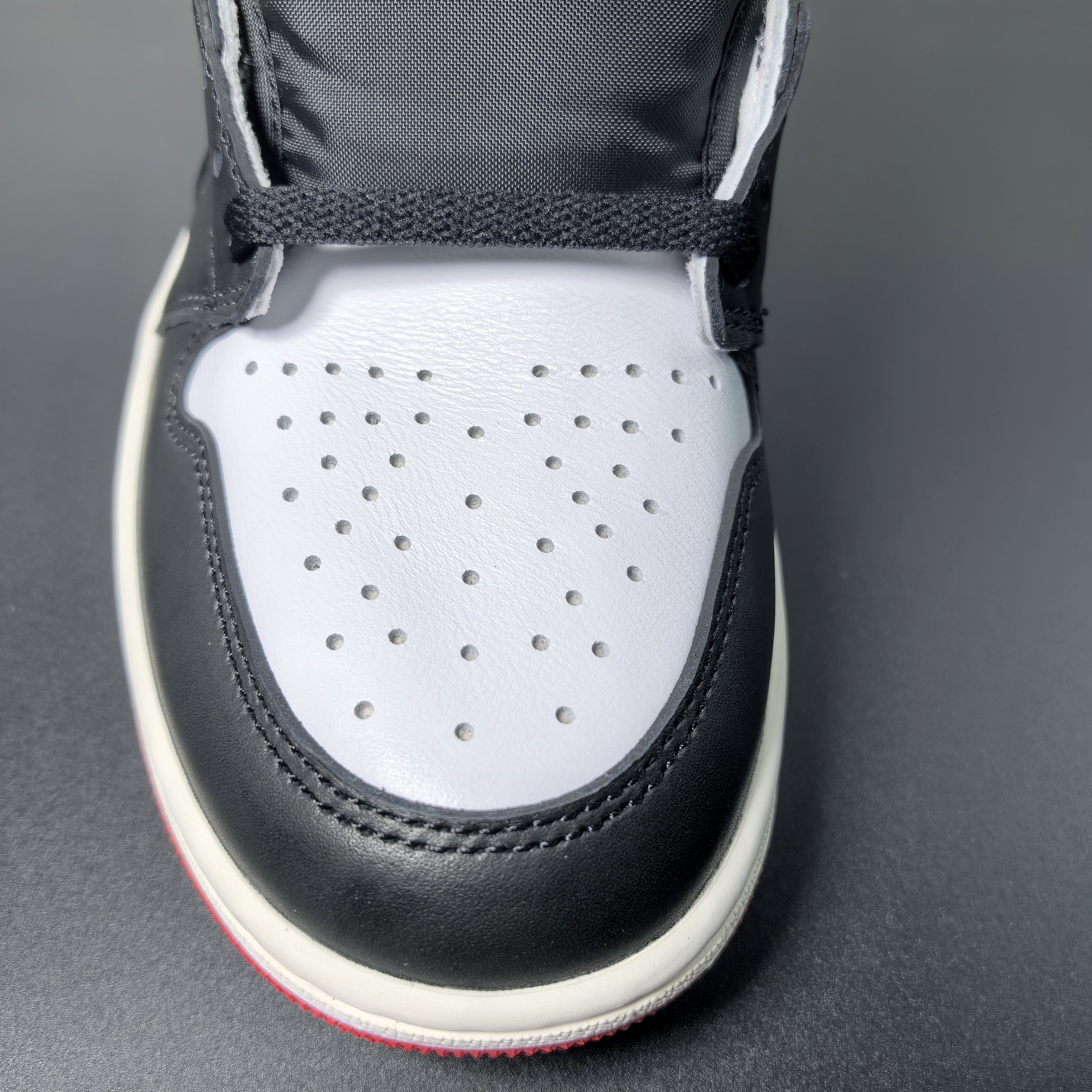 Air Jordan 1 High OG “Black Toe Reimagined”